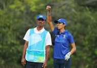 Aditi Ashok chats with her father/caddie Pandit Gudlamani Ashok during the second round of the Women's Individual Stroke Play golf at the Rio 2016 Olympic Games